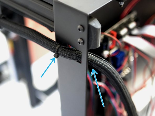 Feed the loom of cables into the base and secure with a cable tie.