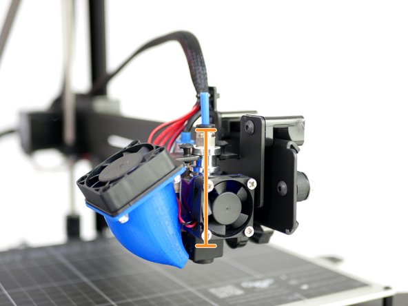 Push the other end of the tubing into the hotend, it should go all the way down to the nozzle.