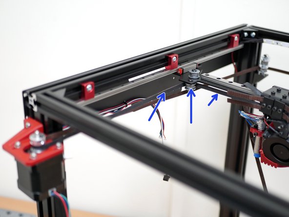 Take the remaining belt and loop it around the idler on the gantry.