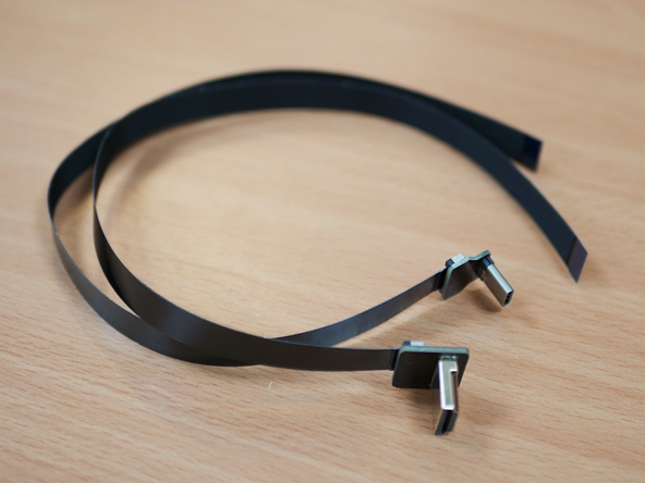 Connect the other ribbon cable to the USB C connector in the same manner.