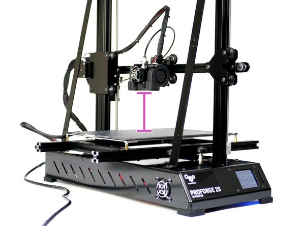 Use the touch screen display to lower the nozzle (z-axis) in 0.1mm increments until it begins to grip the paper.