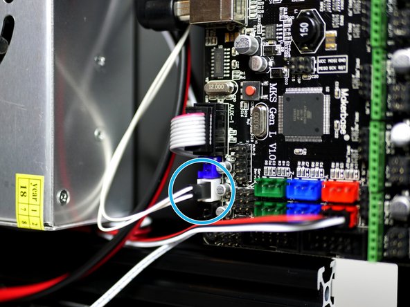 Make sure to leave enough slack in the cable between the tab on the platform and the hole in the base for the platform to reach its extremities on the rollers.