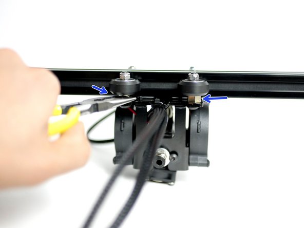 Rotate the Eccentric Spacers with a pair of pliers.