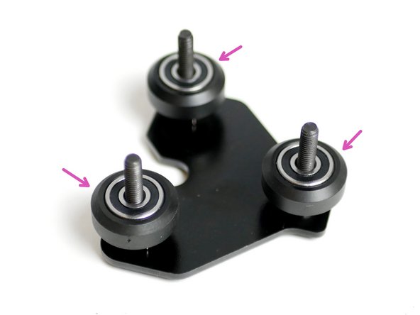 Install the rollers onto the the guided Y-Idler bracket: