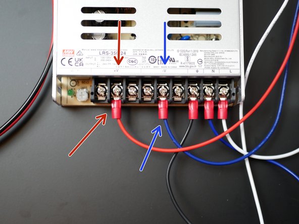 Connect the red and blue cables from the switch to the terminal on the power supply as shown: