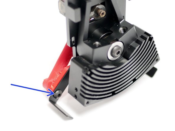 On the front of the assembly, use an M4 x 6mm bolt to secure the angled fan mount.