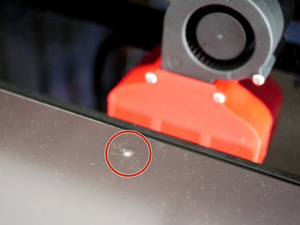 Cut the magnetic base to gain access to the mounting hole for the probe.