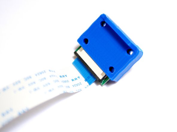 Slide the camera into the 3d printed cover like shown.