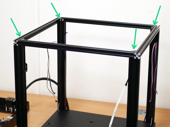 Securely fix the brackets to the internal corners of the printer.