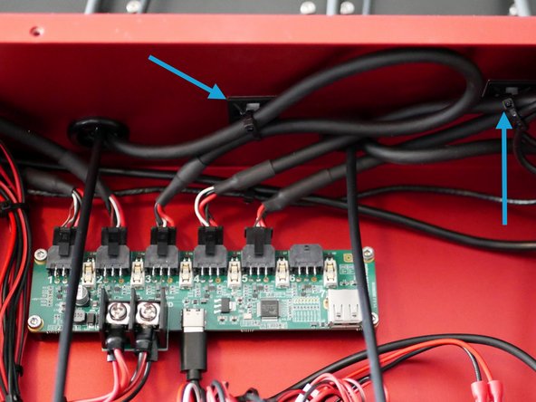 Too keep things tidy we recommend routing these cables under the control board as shown.