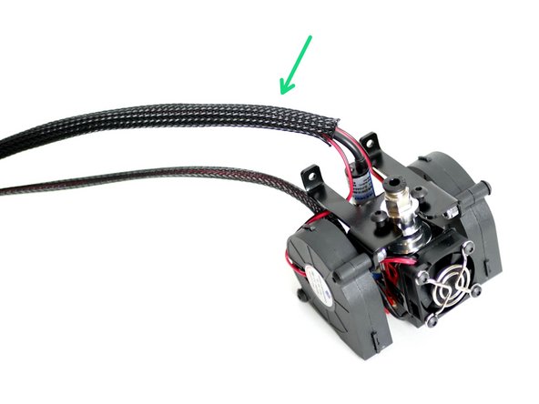 Slide the cable sleeving over the blower fan and probe cables.