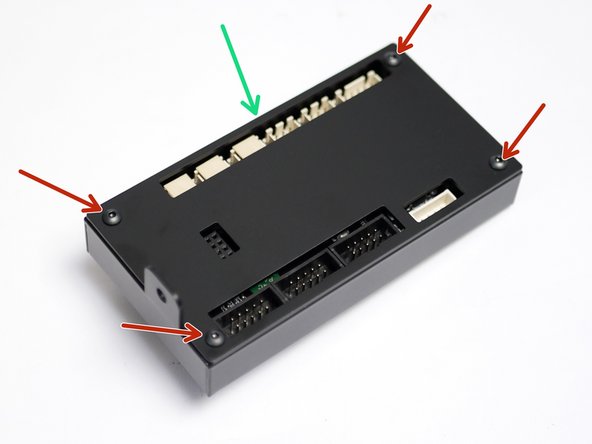 Fix the mounting plate onto the back of the casing as shown.