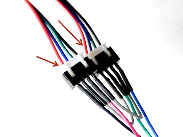Make sure the the red cable is on the same side of the connector for both of the Z-motor Cables. If they are different swap with a cable from one of the other motors.