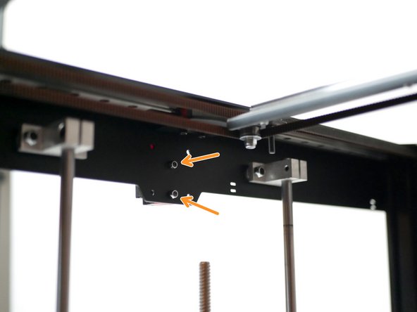 You can secure it to either side of the printer.