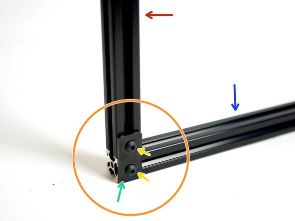 With the 500mm beam laid flat and the 360mm beam on top of it vertically, the metal bracket should be fixed to the right hand side like shown in the image.