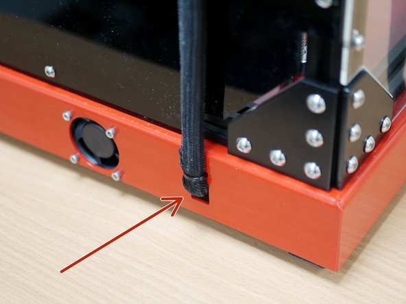Feed the cables into the base using a cable tie to hold it in place.