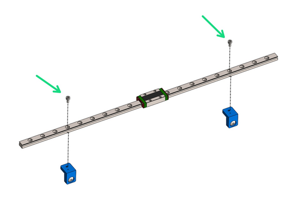 Keep the orange stoppers in place to prevent the carriage from falling off the rail.