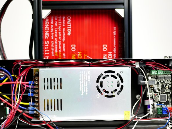 Cable tie the print fan cables to the Hotend cables and tuck away.