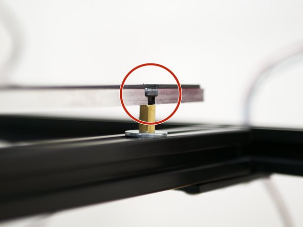 Firmly tighten the rear bolts and hence the mounts to the shorter extrusions,