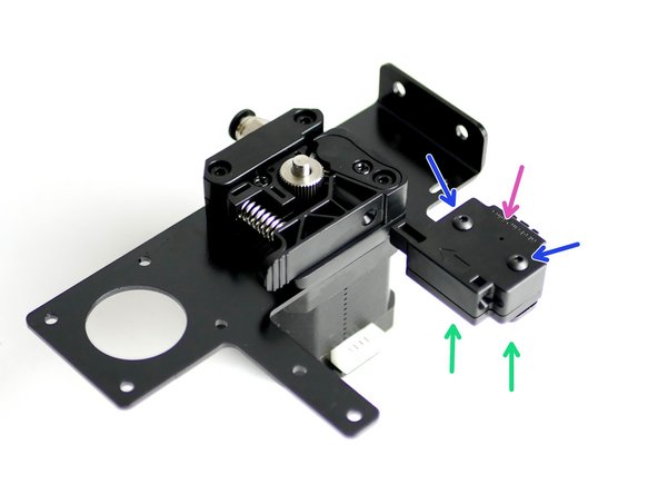 Fix the filament sensor to the Extruder Mounting Bracket: