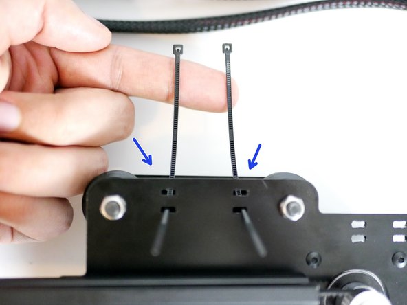 Push two cable ties into the Z-Axis Bracket holes as shown.