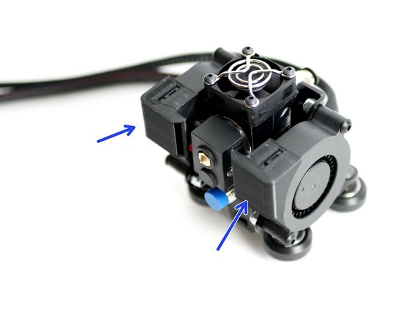 Snap both of the 3D Printed Fan Shrouds onto the Blower Fans.