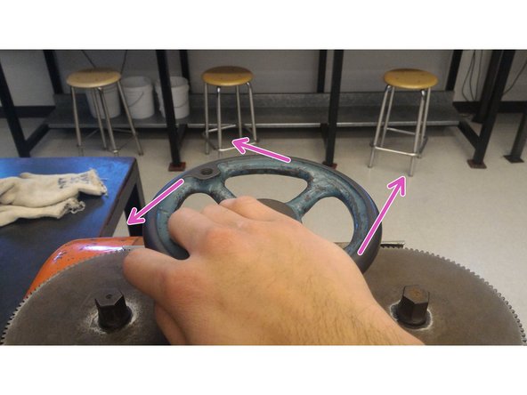 Turn the adjustment wheel counterclockwise to lower the roller by the number tick marks needed. Remember that each division on the dial represents 0.001''.