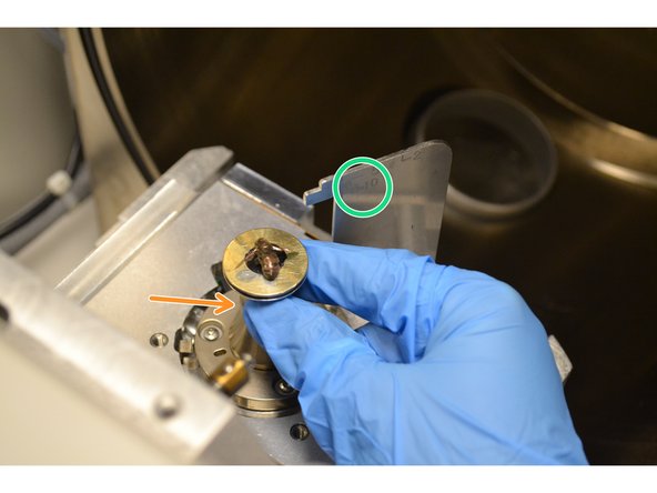 Adjust your sample height so that the highest portion of your sample is level with the 10 mm mark on the metal jig.