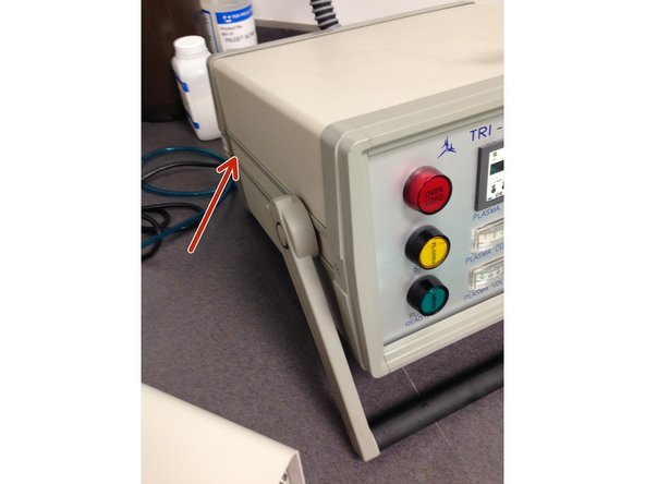 Turn  on main power switch at the back of the unit (near the incoming 120-V AC supply).