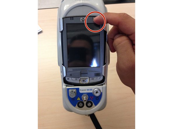 Turn on the HP iPAQ by pressing the power button.