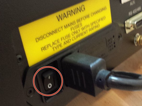Press the power button on the lower right side of the machine to turn it on.