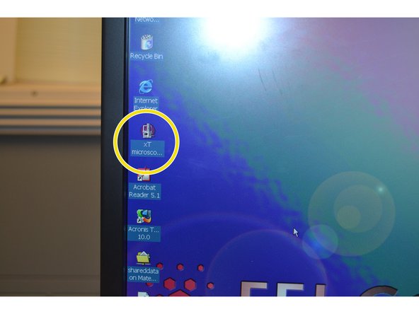 Click the xT Microscope Server icon on the desktop of the right monitor.