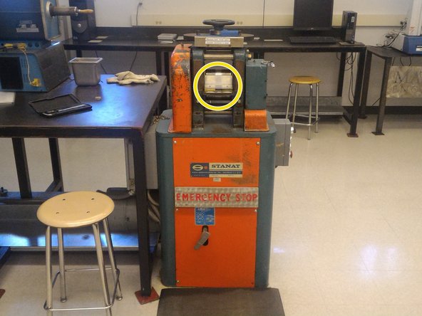 Place the safety guard on the front side of the roller.