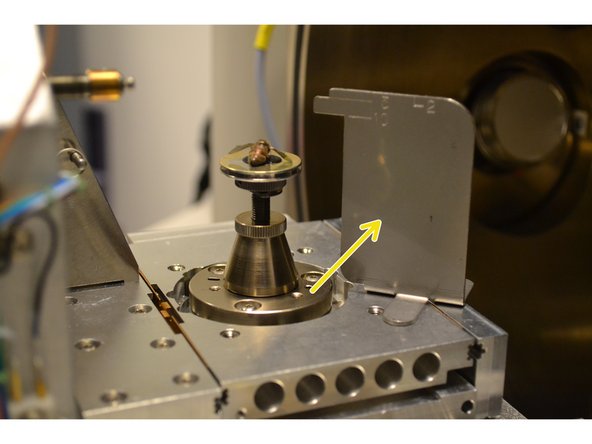 Hand-tighten the set screw using the designated allen wrench.