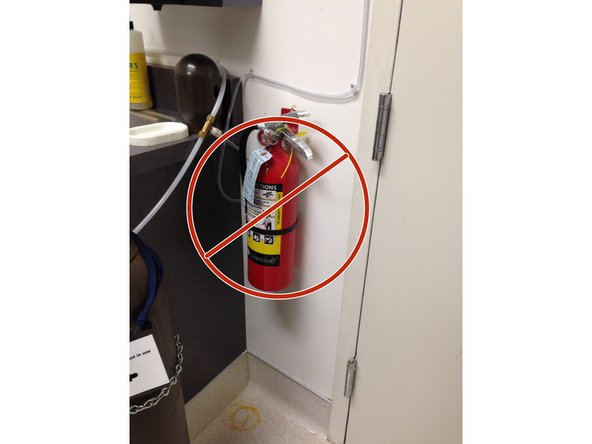 Turn off ignition, oxygen and heat sources if you can do so safely without endangering yourself. Do NOT use extinguisher--this is for emergency personnel.