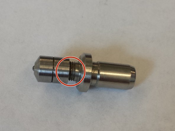 Check to make sure no threads are showing on the indenter.