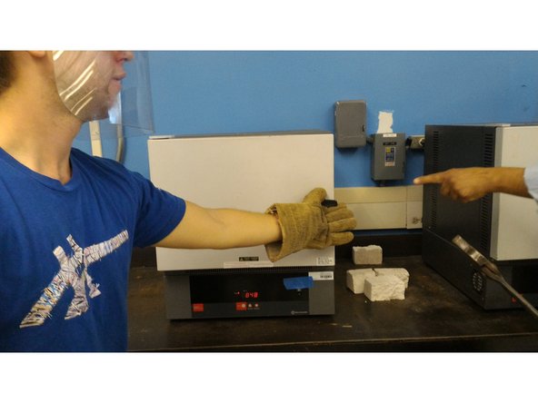 Operator A : While wearing the proper safety gear, turn the handle counter-clockwise to the unlocked position and slowly open the door.