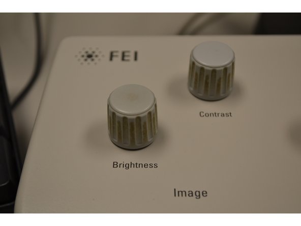 Adjust Brightness and Contrast knobs until you can see your sample on the upper right hand screen.