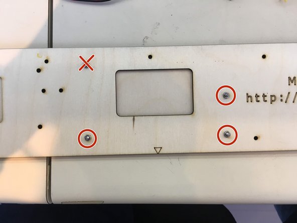 Insert M3x10 screws through the indicated holes and on the other side tighten M3 hex nuts.