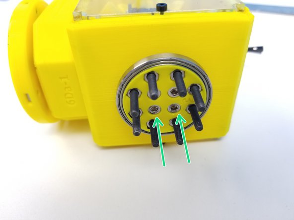 Align the 4 Middle Holes of Clamped Output Disk to the side of the Picasso Box