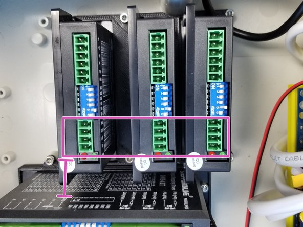 Make sure the adapters are aligned as shown in the picture, Label on the DM542T and DM556T Drivers are facing away from the PSU