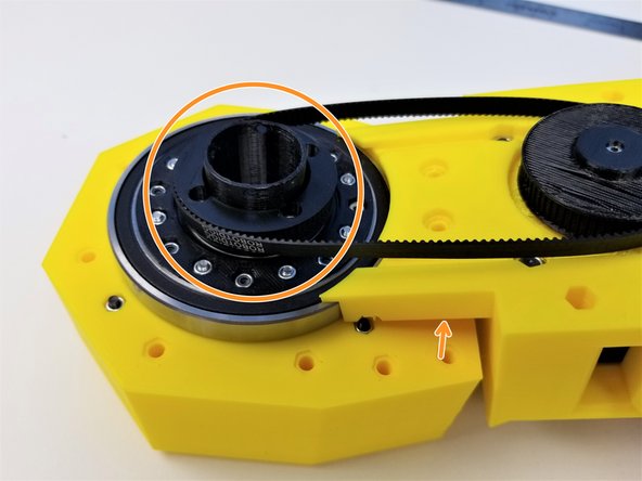 Tile the Motor Mount in an angle and loop the Timing Belt on the Ouput Pulley (gearbox side)