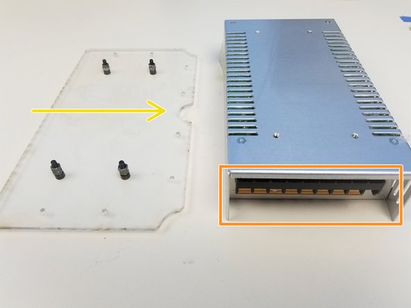Align the PSU and the Acrylic Mounting Plate as shown in the figure exactly