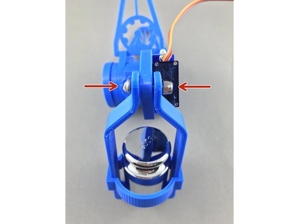 slide in the M3x15 connecting pen holder itself with the weight and secure with nylock M3 nut (Yellow)