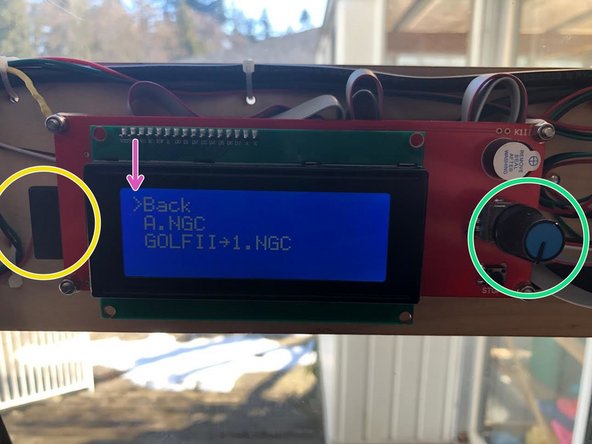 Eject the SD card and plug it into the robot on the left side of the LCD panel.