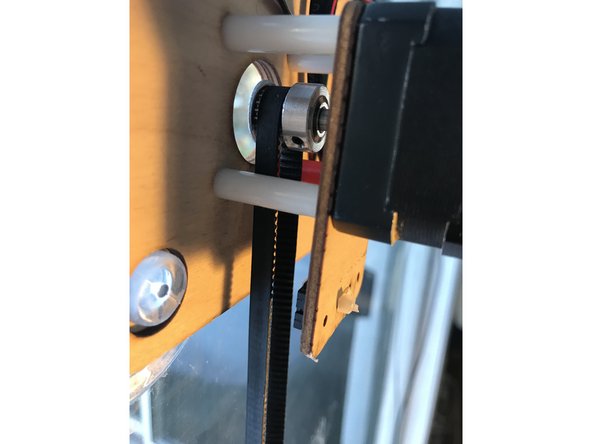 Make sure the belt sits firm on the pinion gear.