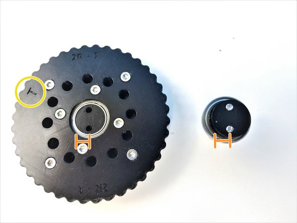 The Screw Head side of each rotor is facing away from each other