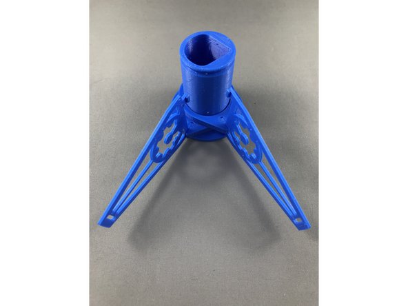 4.    Insert arms (Black) as shown in step by step pictures, align them so they fit snug at the end of the pen holder.