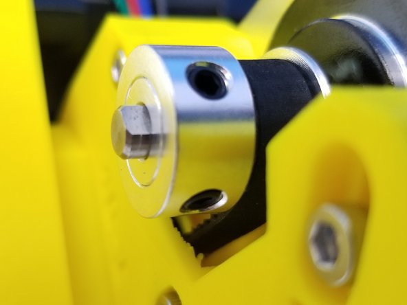 Align one of the Pulley's Set Screw to the D-Cut of the Motor Shaft. Then Secure its place by tightening both Set Screws