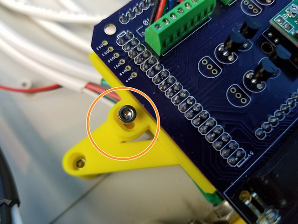 Secure the assembled Arduino Tray with the Right Angle D-Sub Connector to the Case Wall Adapter Slot using the Hex Head Screws